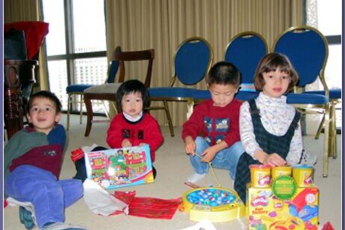 Little cousins opening their Christmas presents in Las Vegas (Dec. 2002).