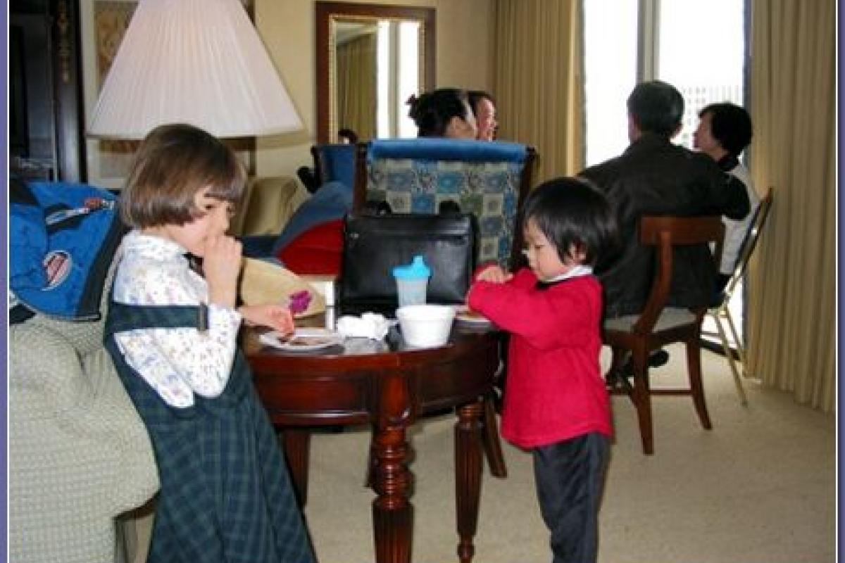 Sarah trying beef jerky for the first time in Las Vegas (Dec. 2002).