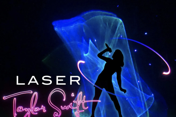 Laser Taylor Swift with green lasers and her silhoutte in black against blue lasers