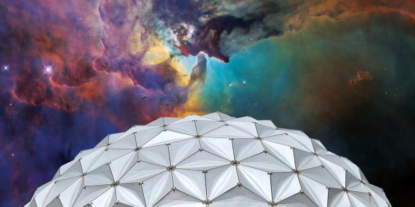 Photo of Fiske dome with nebula in the background on the sky