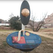Photo of the updated installment of the scale-model solar system. Photo credit: James Negus