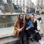 Students at a fountain in France