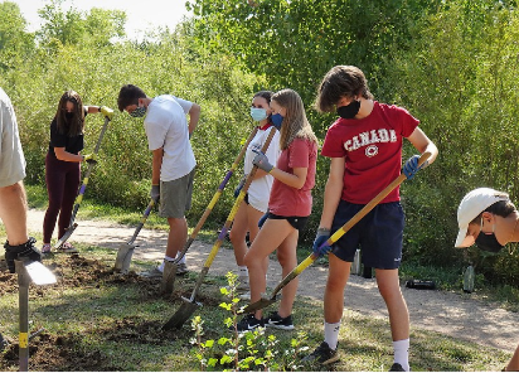 People digging with shovels