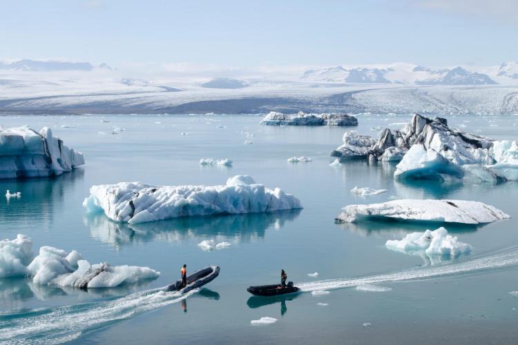 Boats near Arctic ice and water