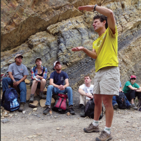 Lon Abbott Explaining a concept to graduate students in the field