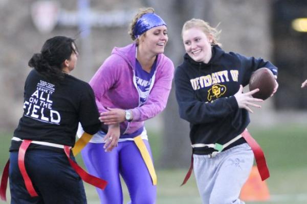 Students playing flag football