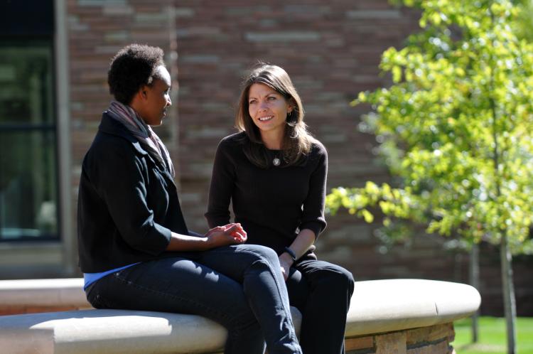 Two women speaking one-on-one