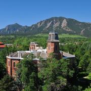 Old Main with the Flatirons in the background