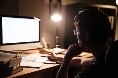 person looking at computer