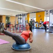 Girl doing a core workout at the rec center