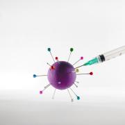 vaccine shot into virus