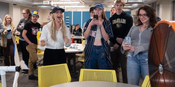 students with small wind turbine