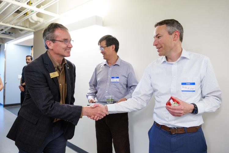 Keith Molenaar (Dean, College of Engineering) and Greg Rieker (Mechanical Engineering)