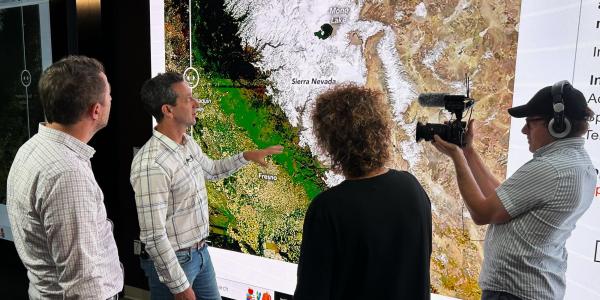 Noah Molotch shows analyses of snow-water equivalent for California at NASA JPL. Photo copyright by and courtesy of PIER GAGNÉ, Radio-Canada.