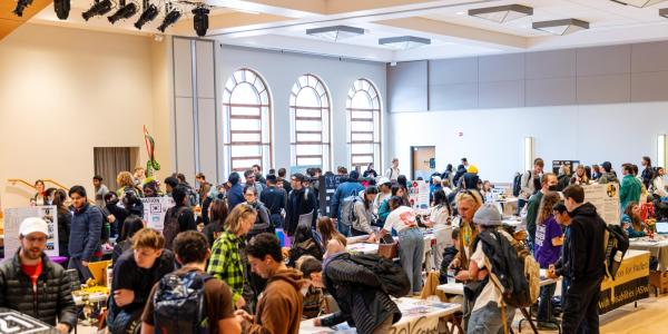 picture of spring involvement fair featuring many students exploring opportunities
