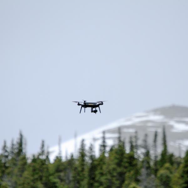 The 3DR Solo flying over the forest canopy in Colorado