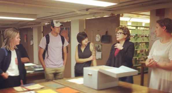 Undergraduate and Graduate students touring the Post-Holocaust American Judaism Collections with Professor Nan Goodman