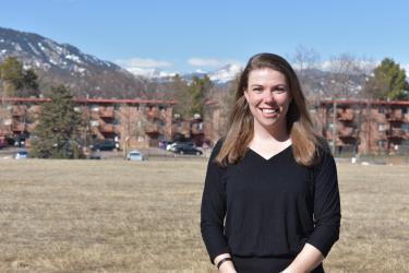 A professional headshot of Allison Crow