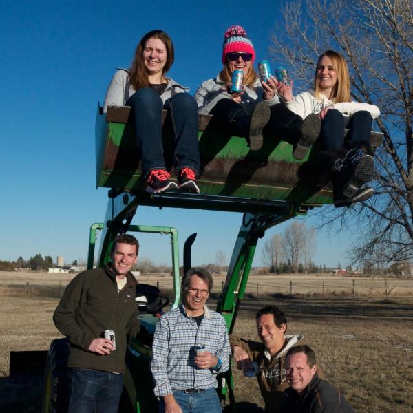 The lab on the tractor