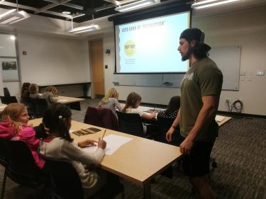 interacting with girls about hands on activities