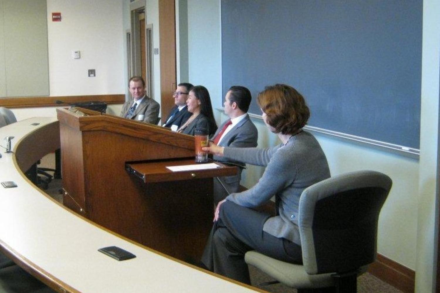 Judge John Madden (Denver District Court), Zach Carlyle (U.S. SEC), Misae Nishikura (Holland & Hart), and Dan McCormick (Kilpatrick Townsend) speak at the Interviewing Tips and Techniques Panel while Jennifer Winslow moderates.