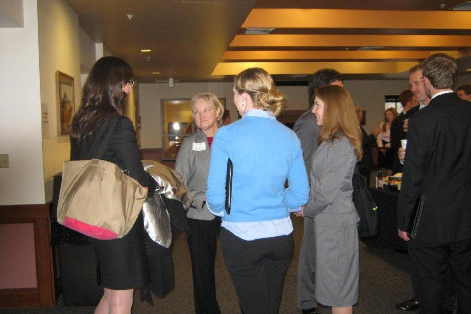 Students create professional connections with employers during the Reception Honoring Employers, sponsored by Husch Blackwell LLP.