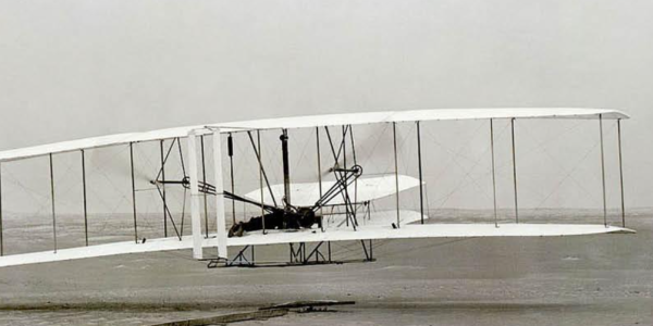 Wright Brothers airplane taking off