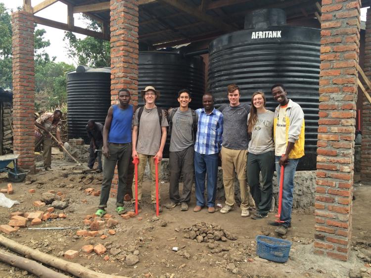 Engineers Without Borders team with water catchment system