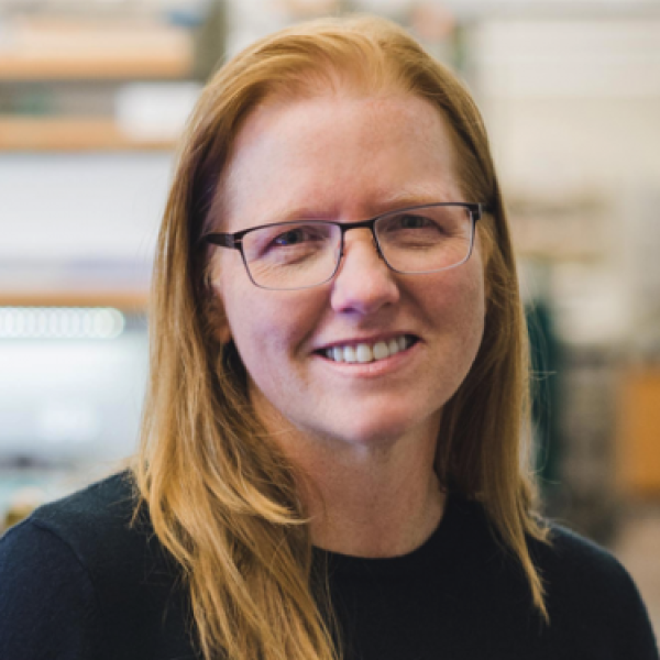 Kristi Anseth with glasses and black shirt