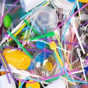 Single use plastic items including utensils, cup toppers, and more