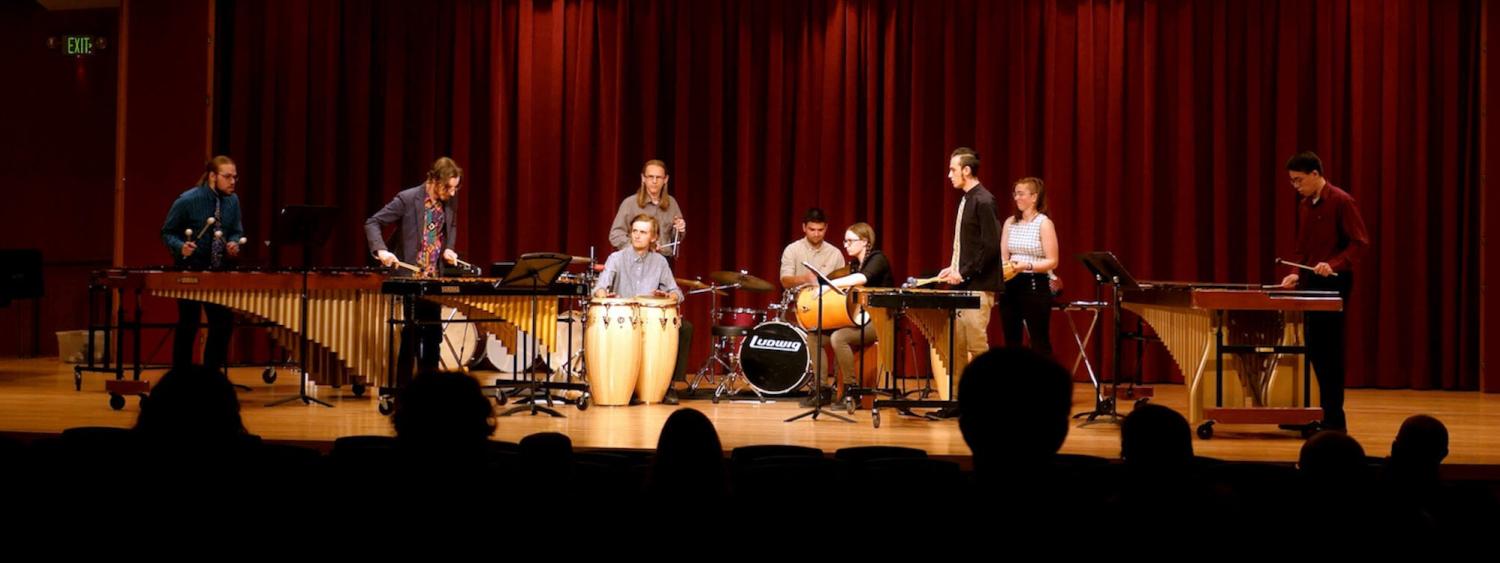 Percussion students performing in Grusin Music Hall