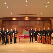 The Early Music Ensemble posing for a photo