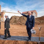 Rob waving at the groundbreaking