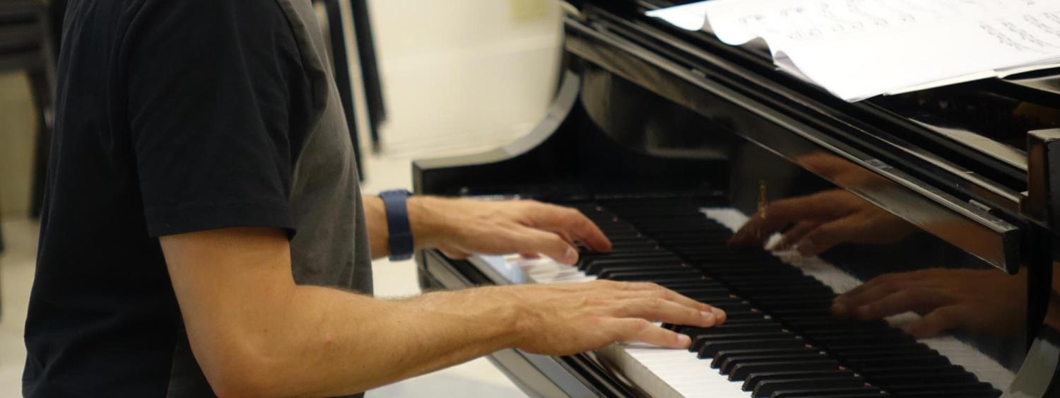Student playing piano