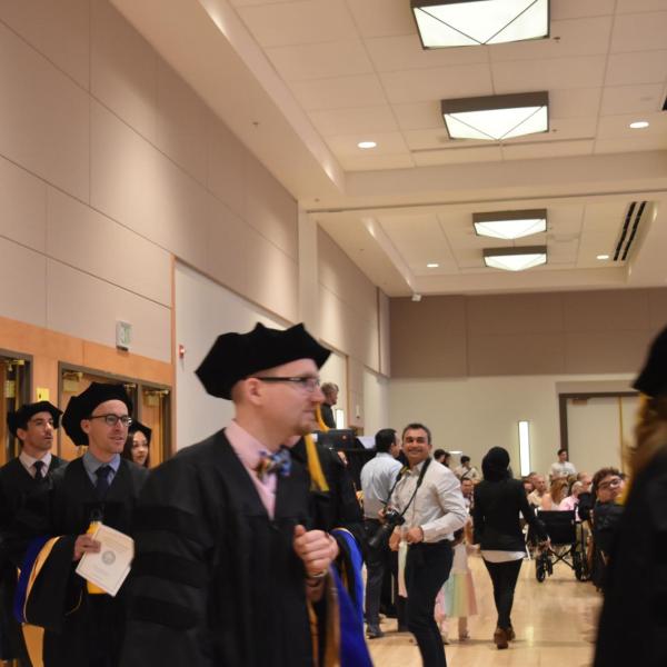 Graduates walking in