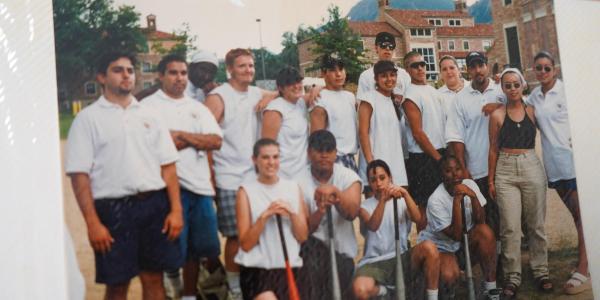 an old photo of PCDP students on a baseball field during the summer program