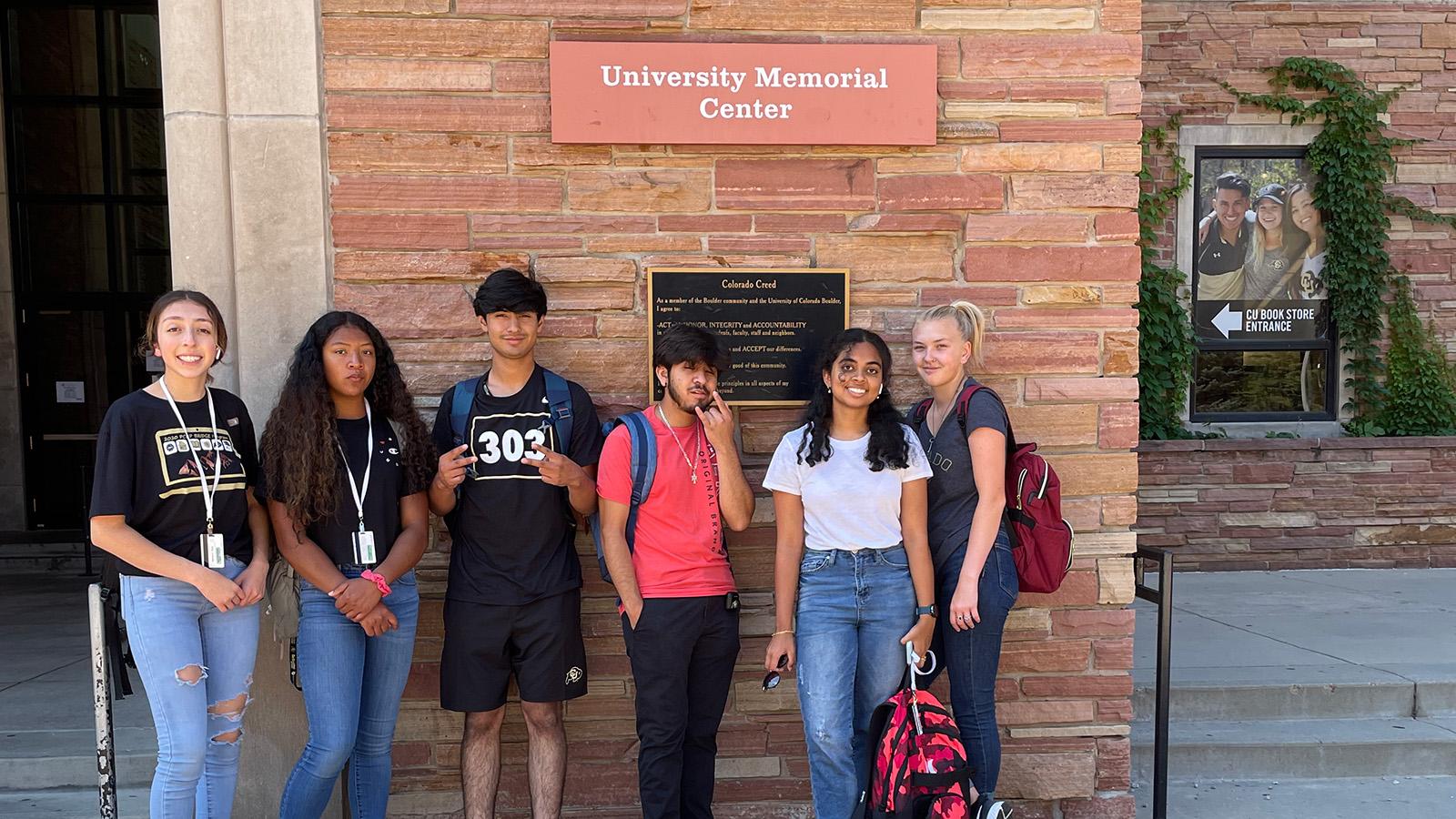 Group of Students in front of the UMC Column.