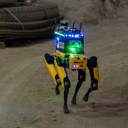A SPOT robot navigating autonomously.