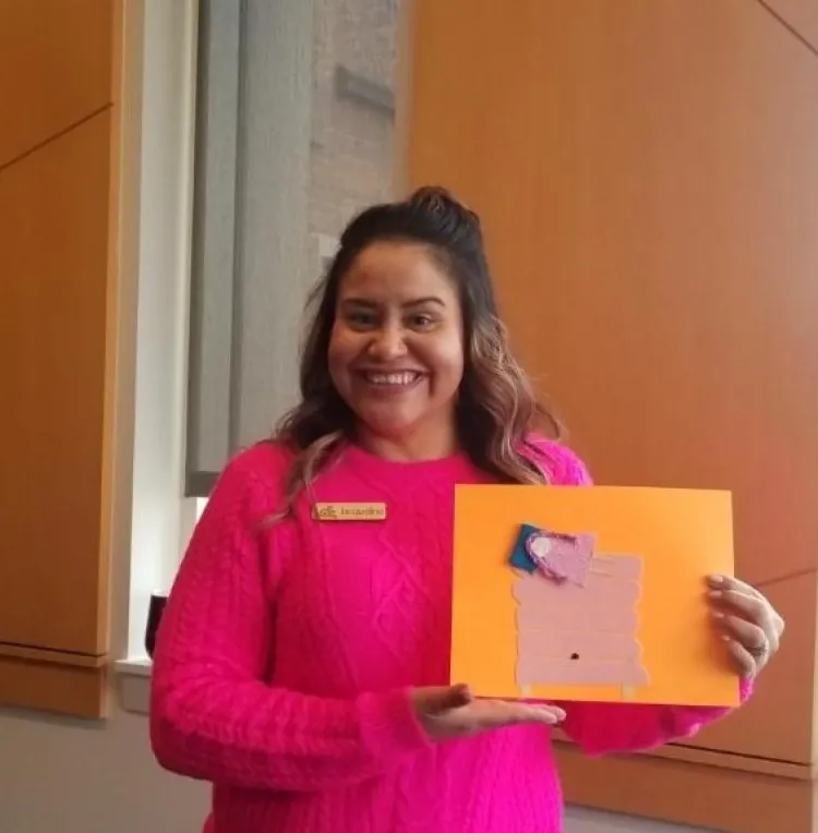 Lady holding an accessible picture