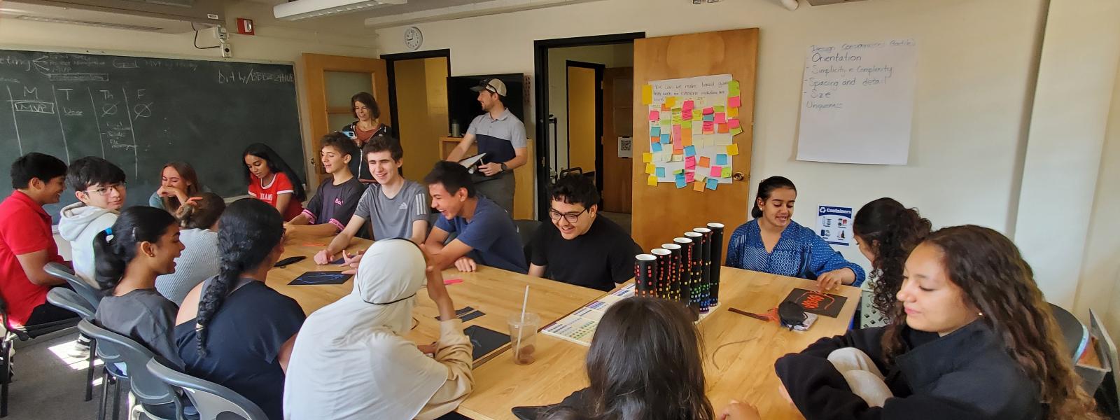 Interns playing tactile pictionary