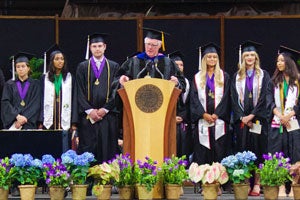 Professor Lewis O. Harvey, Jr., announces the honors graduates