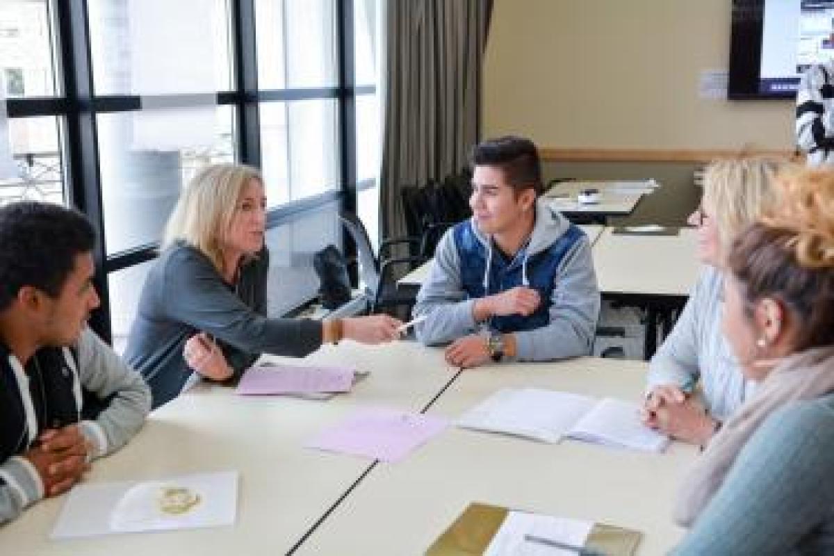 students sitting around a table