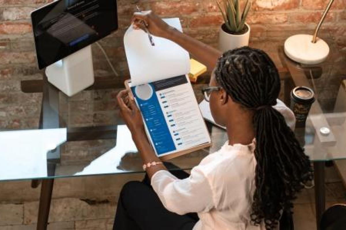 girl looking at tablet