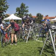 Students browse the used bike sale.