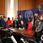 Governor Polis signs the Safety Stop into law.