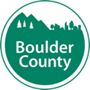 Green circle logo with white text reading "Boulder County."