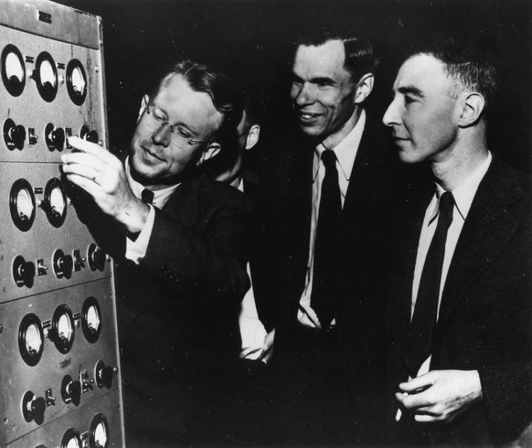 Photograph taken in early 1946 shows (left to right) Dr. Ernest O. Lawrence, Director of the University of California Radiation Laboratory, Dr. Glenn T. Seaborg, head of the Chemistry Division of the Laboratory, and Dr. J. Robert Oppenheimer, a theoretical physicist on the Berkeley facility. c. 1946