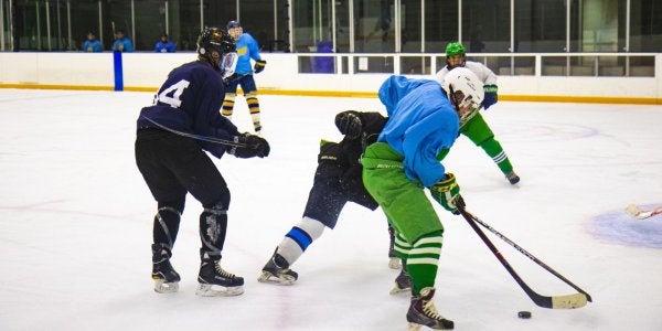 Students playing hockey