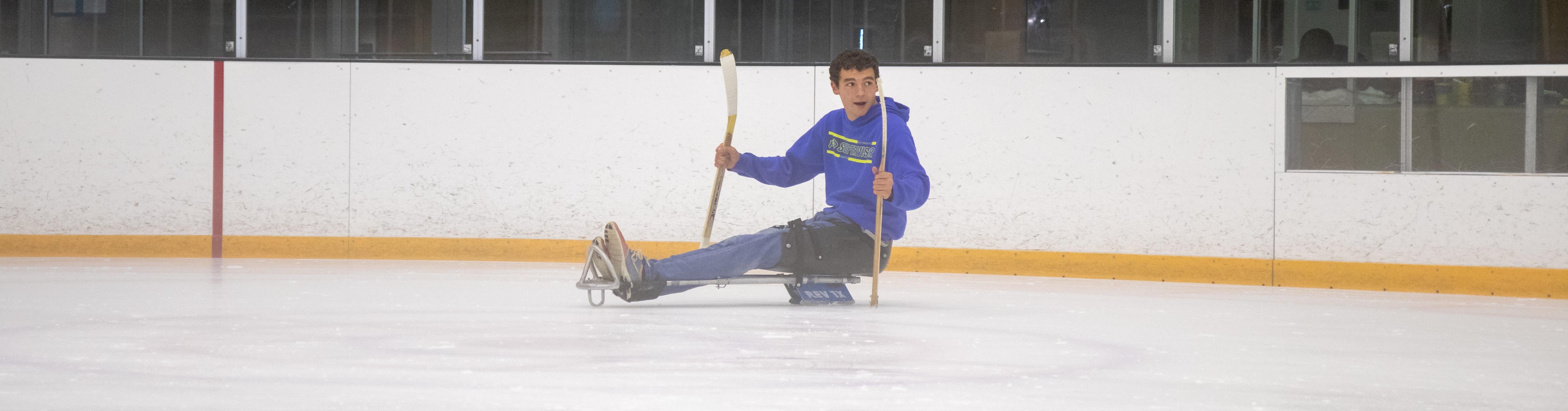 boy on ice sled