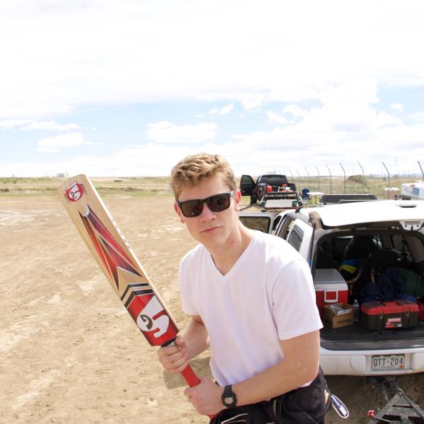 Gardner and a cricket bat 
